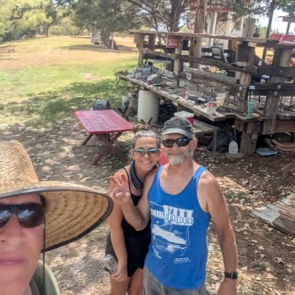 Curtis Hart with two volunteers preparing the outdoor grounds at Muscle Car Ranch for TwisterFest 2026