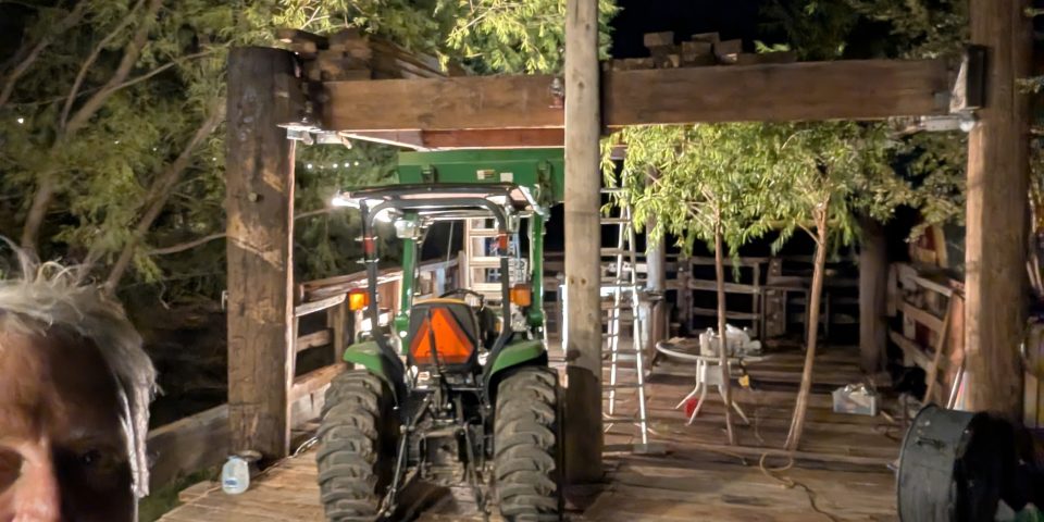Heavy Chevy Stage construction at Muscle Car Ranch with large wood timbers installed across the top