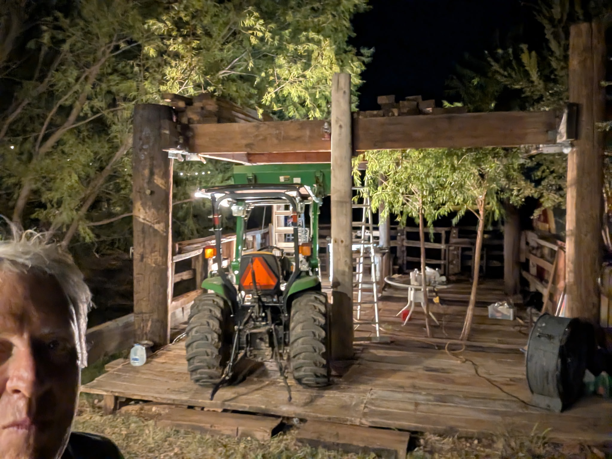 Heavy Chevy Stage construction at Muscle Car Ranch with large wood timbers installed across the top of the structure